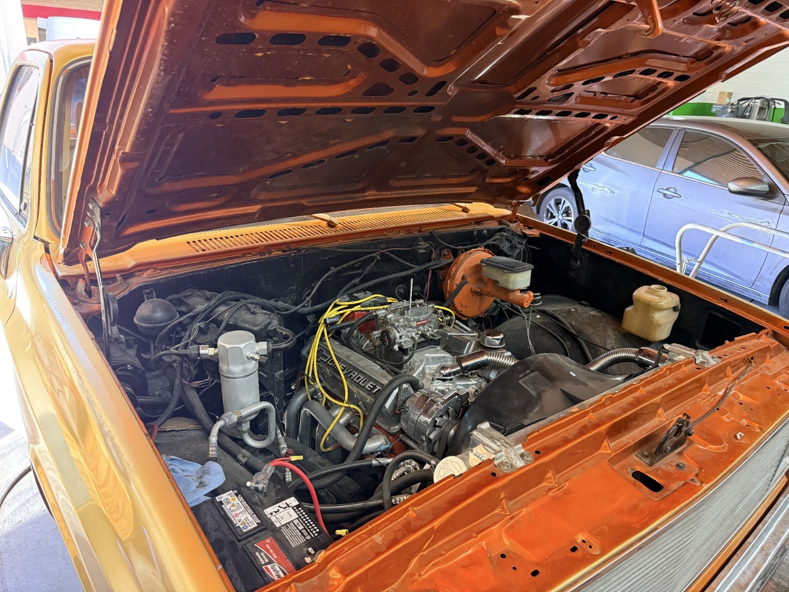 1982 GMC Sierra — Engine bay with hood raised — current condition